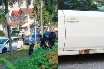 BUSUK DALAM KERETA: Mayat itu disyaki berada dalam kereta di tempat meletak kereta berdekatan kompleks apartmen Apollo Gardens seminggu sebelum ditemui, dan cecair coklat kelihatan mengalir keluar.