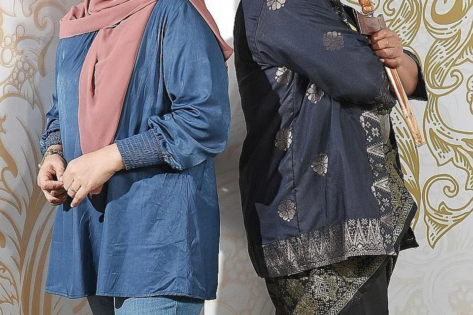 TURUT TABUR BAKTI KEPADA MASYARAKAT: Menerusi Dasyat Giler, Norsiah dan Malik dapat menyalur kerja amal buat dunia hiburan Singapura dan mereka yang menjayakannya. - Foto BH oleh KHALID BABA