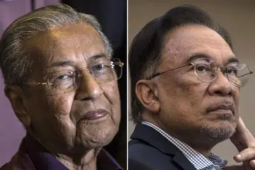 SIAPA BAKAL PERDANA MENTERI: Dr Mahathir Mohamad (kiri) percaya penyelesaian kepada kemelut politik semasa di Malaysia adalah dengan membentuk kerajaan yang tidak memihak kepada mana-mana parti, sementara Datuk Anwar Ibrahim berkata kerajaan perpaduan yang dicadangkan Dr Mahathir tidak bertepatan dengan sistem demokrasi berparlimen yang telah lama diamalkan di Malaysia.