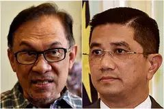VIDEO SEKS SEJENIS: Datuk Seri Azmin (kanan) nafi terlibat dalam video seks sejenis yang tular sementara Datuk Seri Anwar juga nafi terlibat merancang penghasilan video tersebut.