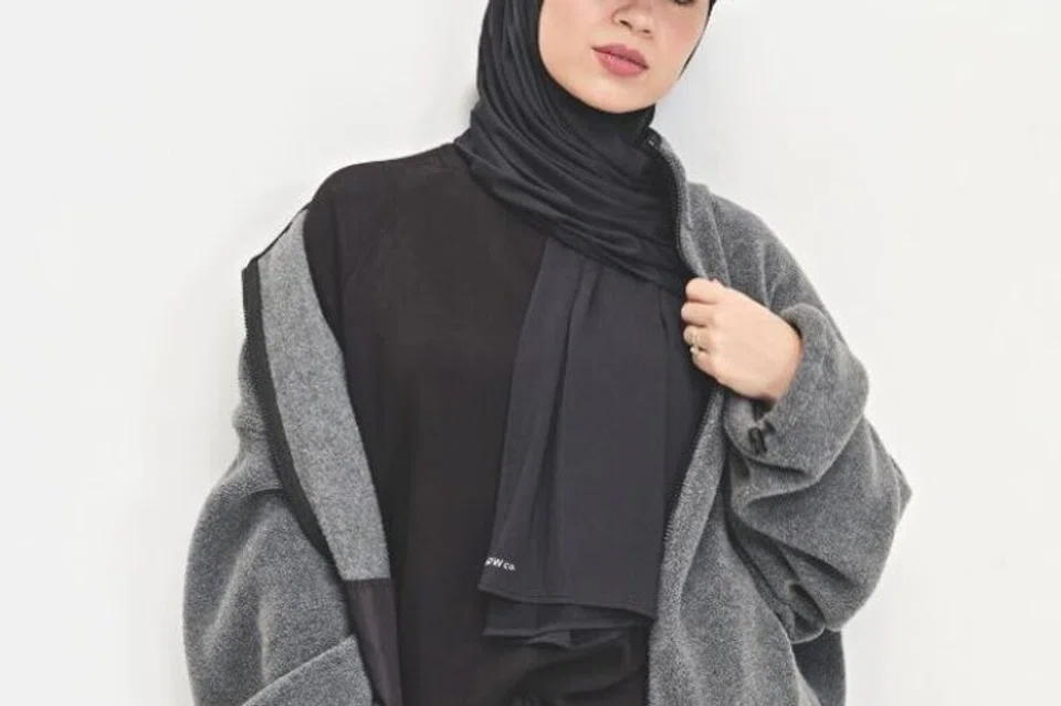 Cik Nawal Alhaddad, 35 tahun, mereka pakaian sukan yang sopan dan membuka Glowco Move, sebuah studio kecergasan khas untuk wanita.