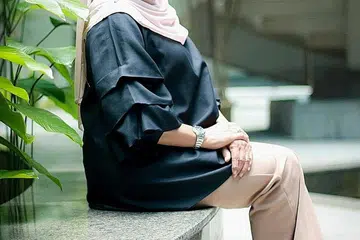 MASIH AKTIF: Dari 1970-an hingga kini, Junainah M. Amin (atas) masih terus bergiat aktif dalam bidang seni suara. - Foto BH oleh NUR DIYANA TAHA