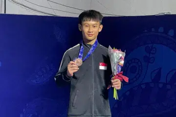 Remaja berusia 16 tahun, Jovi Loh, memenangi pingat gangsa dalam acara palang selari di Kejohanan Gimnastik Artistik Asia Remaja Lelaki di Tashkent, Uzbekistan, pada 19 Mei. 