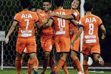 GOL ISTIMEWA: Fairoz Hassan (dua dari kiri) meraikan gol yang dijaringkannya semasa Albirex menentang Sailors. - Foto SPL