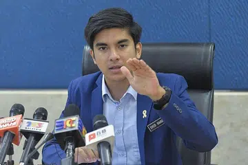 SYED SADDIQ SYED ABDUL RAHMAN: Didakwa melakukan pengubahan wang haram dengan memindahkan hasil kegiatan haram berjumlah RM100,000.