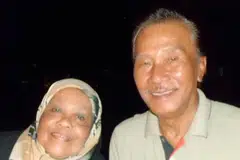 KEPINGAN GAMBAR ISTIMEWA: Allahyarham  Ali Yusoff, bekas jurugambar The Straits Times (ST), bersama isterinya Allahyarhamah Siti Meryam Abdul Manaf.