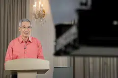  SIARAN NASIONAL: Perdana Menteri Encik Lee Hsien Loong buka tirai siri siaran nasional dengan bercakap tentang cara mengatasi krisis segenerasi. - Foto MCI