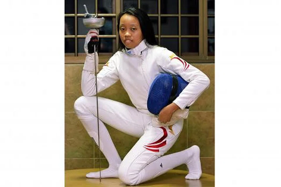 IMPIAN TINGGI MELANGIT: Kiria Tikanah mendambakan peluang mewakili Singapura di Sukan Olimpik satu hari nanti. - Foto-foto KHALID BABA