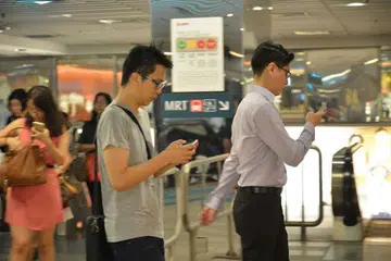 SATU KEMUDAHAN: Telefon bijak merupakan alat yang paling aktif digunakan mereka yang ditinjau. - Foto THE STRAITS TIMES