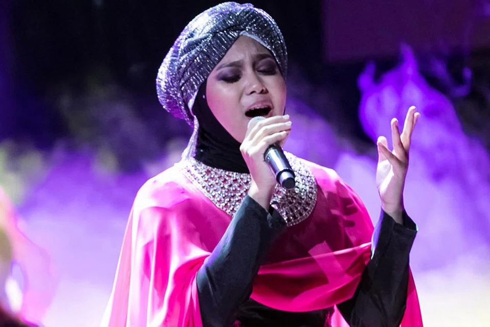 SITI SANIYAH: Memiliki suara emas dan daya persembahan menakjubkan. - Foto AXN ASIA. 
