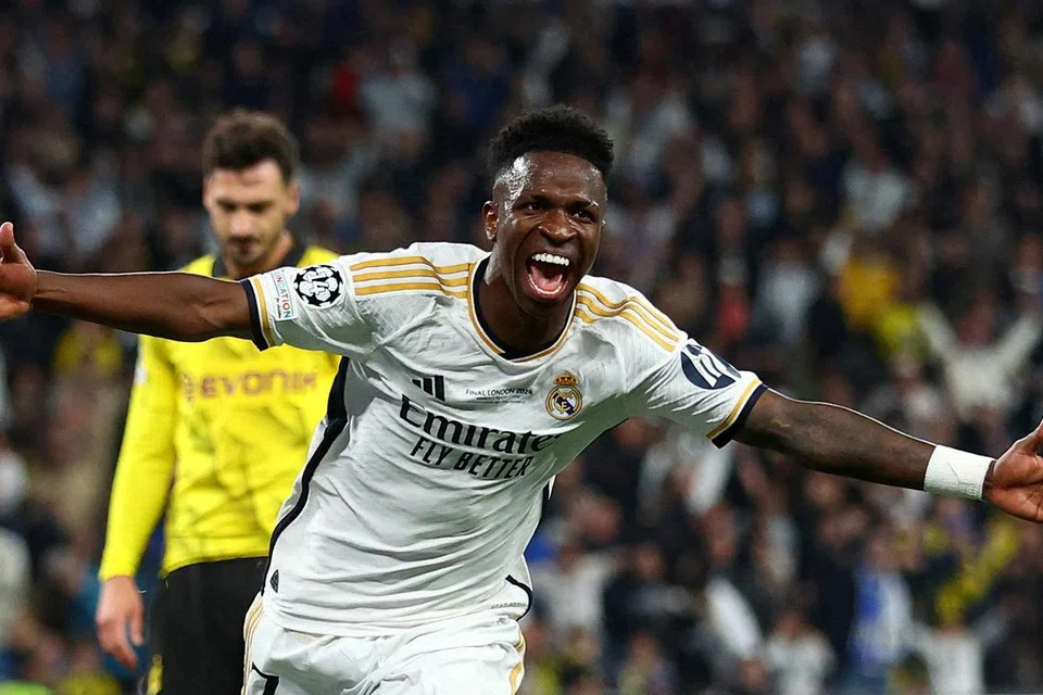Penyerang Real Madrid, Vinicius Junior, meraikan gol kedua dalam perlawanan akhir Liga Juara-Juara di Stadium Wembley pada 1 Jun. 