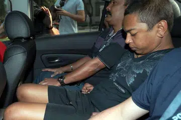 Muhammad Faizal Md Jamal (atas) dituduh membunuh Encik Satheesh Kumar Manogaran di St James Power Station. 