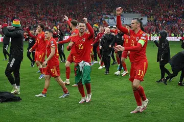 KEJAYAAN BERSEJARAH: Bintang Wales termasuk Gareth Bale (jersi 11) dan Aaron Ramsey (jersi 10) meraikan kemenangan ke atas Ukraine. - Foto REUTERS