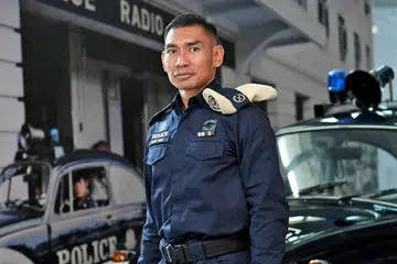 PIKUL PELBAGAI TANGGUNGJAWAB: Selain memikul tanggungjawab sebagai Timbalan Penolong Pesuruhjaya (DAC)(NS) dengan Pasukan Polis Singapura (SPF), Encik Mohammed Azhar Yusof juga berkhidmat sebagai Adikong Kehormat Presiden dan juga Timbalan Komander (NS) bagi Komand Keselamatan Perlindungan (ProCom). - Foto BH oleh KHALID BABA