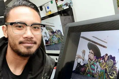 BERGABUNG TENAGA: Encik Eman telah bergabung dengan seorang pelukis Mexico dan menghasilkan satu lukisan tembok bagi satu pesta budaya Spotlight Singapore Mexico City. - Foto JOHARI RAHMAT
