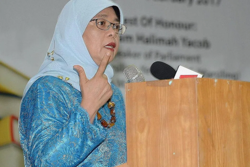 CIK HALIMAH YACOB: Telah mengagihkan baucar susu bernilai sekitar $10,000 kepada ibu bapa muda yang memerlukan. - Foto fail