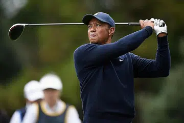 TIDAK BIMBANG: Walaupun usianya yang semakin meningkat menjejas prestasinya, Woods tidak terlalu bimbang berhadapan dengan pemain hebat lain yang bersaing merebut kejohanan Major ke-83. - REUTERS