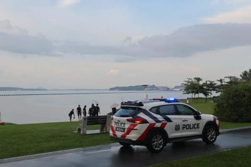 Kenderaan polis dilihat di pantai Pasir Ris sekitar 6.30 petang pada 5 Julai.