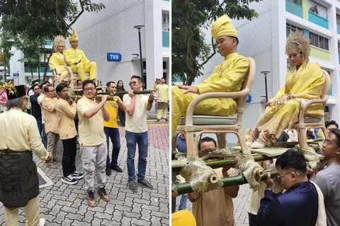 RAJA DAN PERMAISURI: Pengantin baru, Encik Nazran Zaiyani Ahmad Jufri, 26 tahun dan, Cik Nor Natisha Yusoff, 24 tahun ditandu  ketika berarak masuk ke dewan acara di Yew Tee pada 31 Disember 2023.