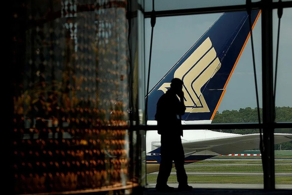 CABARAN BELUM PERNAH DIALAMI: Kumpulan Singapore Airlines (SIA) mengambil langkah menggantung kebanyakan pesawat SIA, SilkAir dan Scoot dalam apa yang disifatkan keadaan paling mencabar sejak kewujudannya. - Foto REUTERS