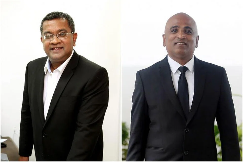 Encik Eugene Thuraisingam (kiri) dan Encik M. Ravi 