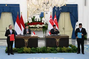 kredit karbon, Singapura Indonesia, perdagangan rentas sempadan
