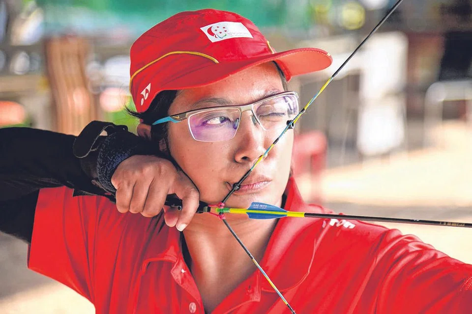 CIPTA SEJARAH: Syahidah ialah pemanah pertama dari Team Singapore yang melayakkan diri ke Sukan Paralimpik. - Foto-foto SHAKIR SAIFUDDIN 
