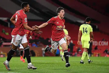 GOl!: Pemain 'midfield' Manchester United Daniel James (tengah) begitu gembira selepas menjaringkan gol kedua pasukannya dalam perlawanan dengan Newcastle di Old Trafford, awal pagi semalam. United menang 3-1. - Foto AFP