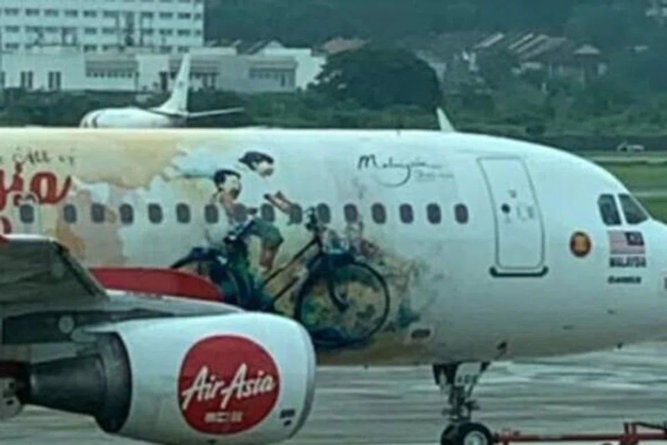 Malaysia, mural, Pulau Pinang, Penang, Ernest Zacharevic, Kids on Bicycle, Air Asia, saman