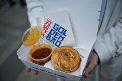 Golden Bao mula terkenal dengan ‘beef roti’ di Bazar Ramadan Kampong Gelam tahun lalu. Beef roti, $10, mereka unik kerana dipadankan dengan minyak cili.