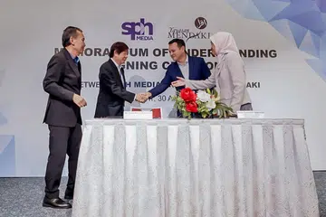 METERAI MOU: (Dari kiri) Encik Saat, Encik Khaw, Encik Zaqy dan Cik Zuraidah hadir bagi majlis menandatangani MOU yang diadakan di auditorium SPH Media semalam. - Foto BH oleh NUR DIYANA TAHA