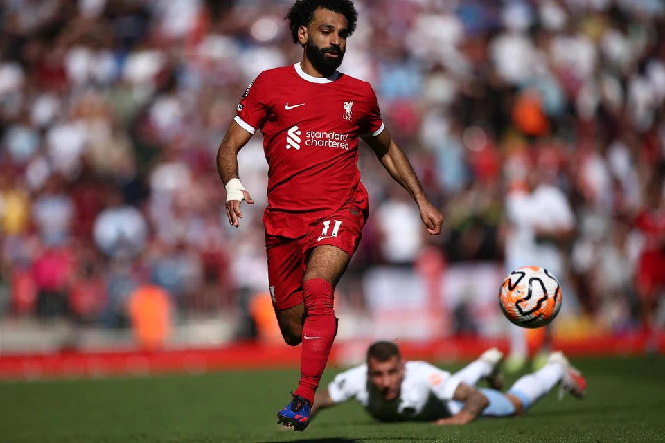 KEKAL DI ANFIELD: Mohamed Salah kekal pemain Liverpool musim ini. Tapi sehingga bila?