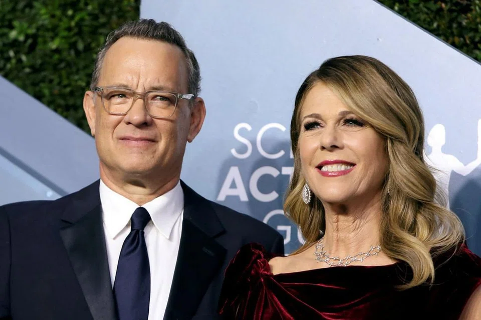 TOM HANKS & RITA WILSON.