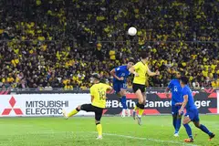 Aksi perlawanan antara Singapura dengan Malaysia di Stadium Nasional Bukit Jalil pada Selasa (3 Januari). - Foto FAS 
