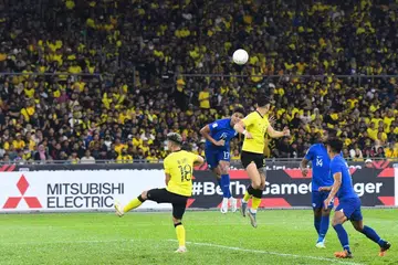 Aksi perlawanan antara Singapura dengan Malaysia di Stadium Nasional Bukit Jalil pada Selasa (3 Januari). - Foto FAS 