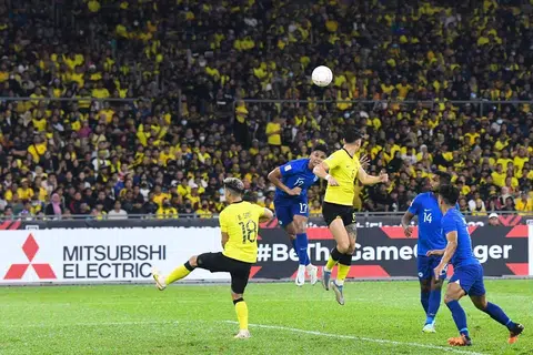 Aksi perlawanan antara Singapura dengan Malaysia di Stadium Nasional Bukit Jalil pada Selasa (3 Januari). - Foto FAS 