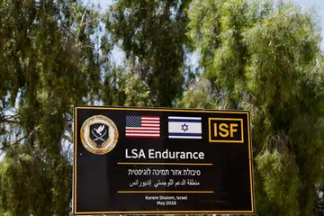 Papan tanda di pintu masuk LSA Endurance, sebuah kemudahan sokongan logistik dan persiapan yang diwujudkan bagi menyokong Pasukan Penstabilan Antarabangsa (ISF) di bawah arahan Lembaga Keamanan, berhampiran sempadan Israel-Gaza di kawasan Kerem Shalom, selatan Israel, pada 10 Ogos 2026.