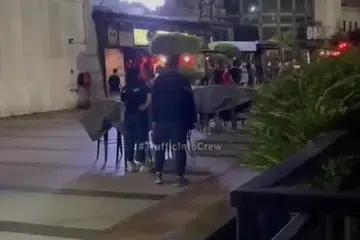 Tangkap layar video yang dimuat naik berikutan kes merusuh menggunakan kayu di hadapan sebuah restoran bistro di Johor Bahru, pada awal pagi 14 Mac.