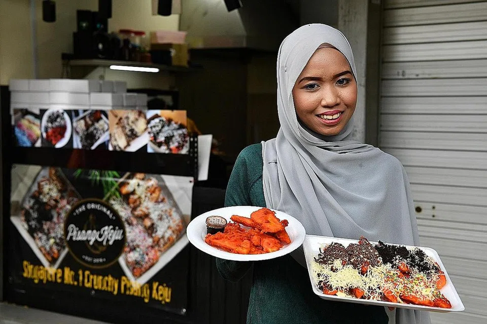  JATUH TAPI BANGUN SEMULA: The Original Pisang Keju milik Cik Haslinah tidak lagi mempunyai kedai fizikal buat masa kini. Kedai yang terletak di East Coast Lagoon sebelum ini telah ditutup sebelum langkah CB dimulakan. - Foto fail
