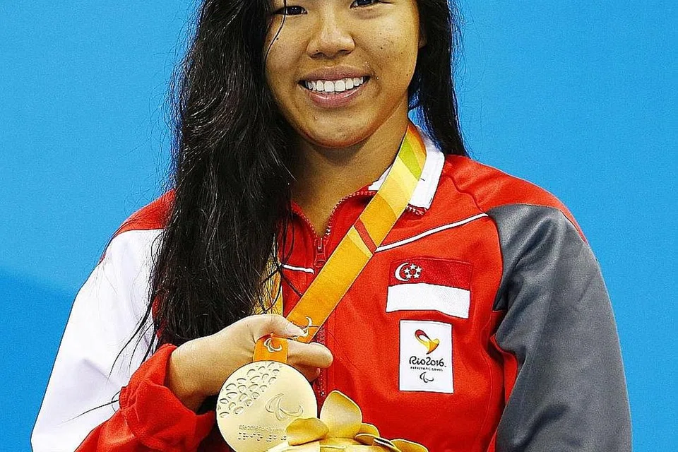 YIP PIN XIU: Ratu renang negara.