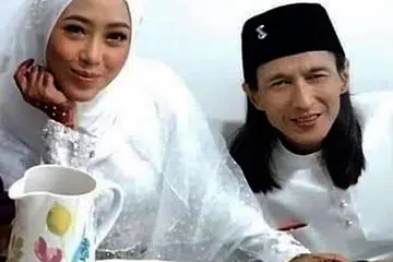 PASANGAN HIDUP: Zamani (kanan) bersama isterinya Nur Juliana. - Foto OH BULAN