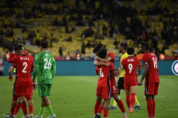 Pemain Singapura meraikan kelayakan mereka ke separuh akhir Piala AFF Mitsubishi Electric selepas mendapatkan keputusan seri 0-0 semasa menentang Malaysia di Stadium Nasional Bukit Jalil, Kuala Lumpur, pada 20 Disember. 