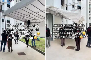 ANGKAT SENDIRI: Seramai 10 kakitangan membantu untuk mengalihkan khemah ke tapak sepatutnya bagi satu acara walimah.