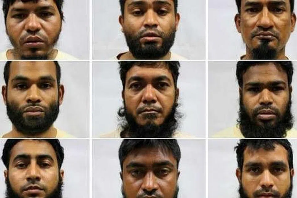 DITAHAN BAWAH ISA: (Barisan atas dari kiri) Alam Khurshed, 27; Alam Mahabub, 34; Ali Abdul, 40. (Barisan tengah) Ali Md Ashraf, 33; Alim Abdul, 32; Aminur, 31. (Barisan bawah) Golam Jilani Abdur Rouf, 27; Haque Md Mofazzal, 29; Hasan Md Mahmudul, 30. - Foto MHA