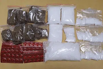 Pil 'Ice', ganja dan Erimin-5 ditemui di sebuah unit di kawasan Jalan Selamat operasi yang dilaksanakan CNB pada 7 Oktober 2020. - FOTO: CNB