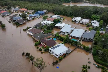 Keadaan banjir di sekitar Jalan Settlement Point di Port Macquarie, New South Wales, Australia, pada 22 Mei 2025. Hujan lebat di sepanjang pantai timur Australia, menyebabkan ribuan penduduk terperangkap.