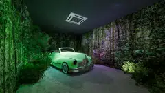 At LKY: The Experience, Lee Kuan Yew's budding romance with Kwa Geok Choo is evoked in a stage setting involving a vintage car surrounded by greenery.