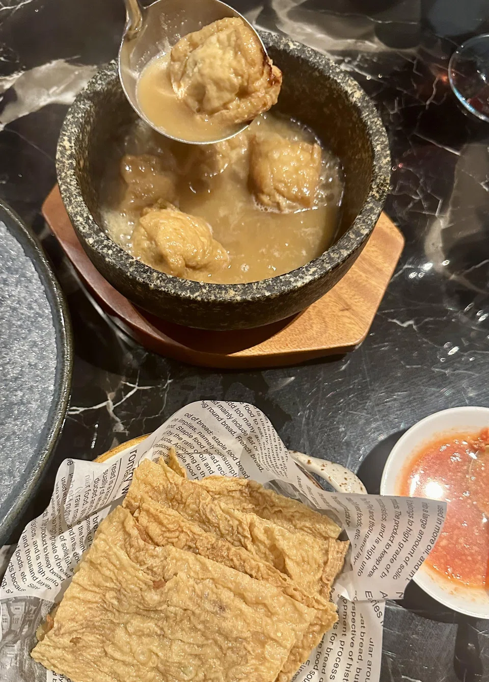 The claypot yong tau foo is served with crispy beancurd skin.