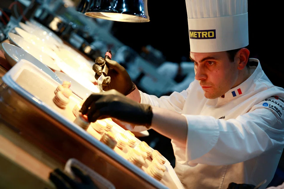 Chef Paul Marcon of France prepares a dish during the Grand Final of the Bocuse d’Or gastronomic competition.  French domination of the contemporary culinary world is built into modern history.