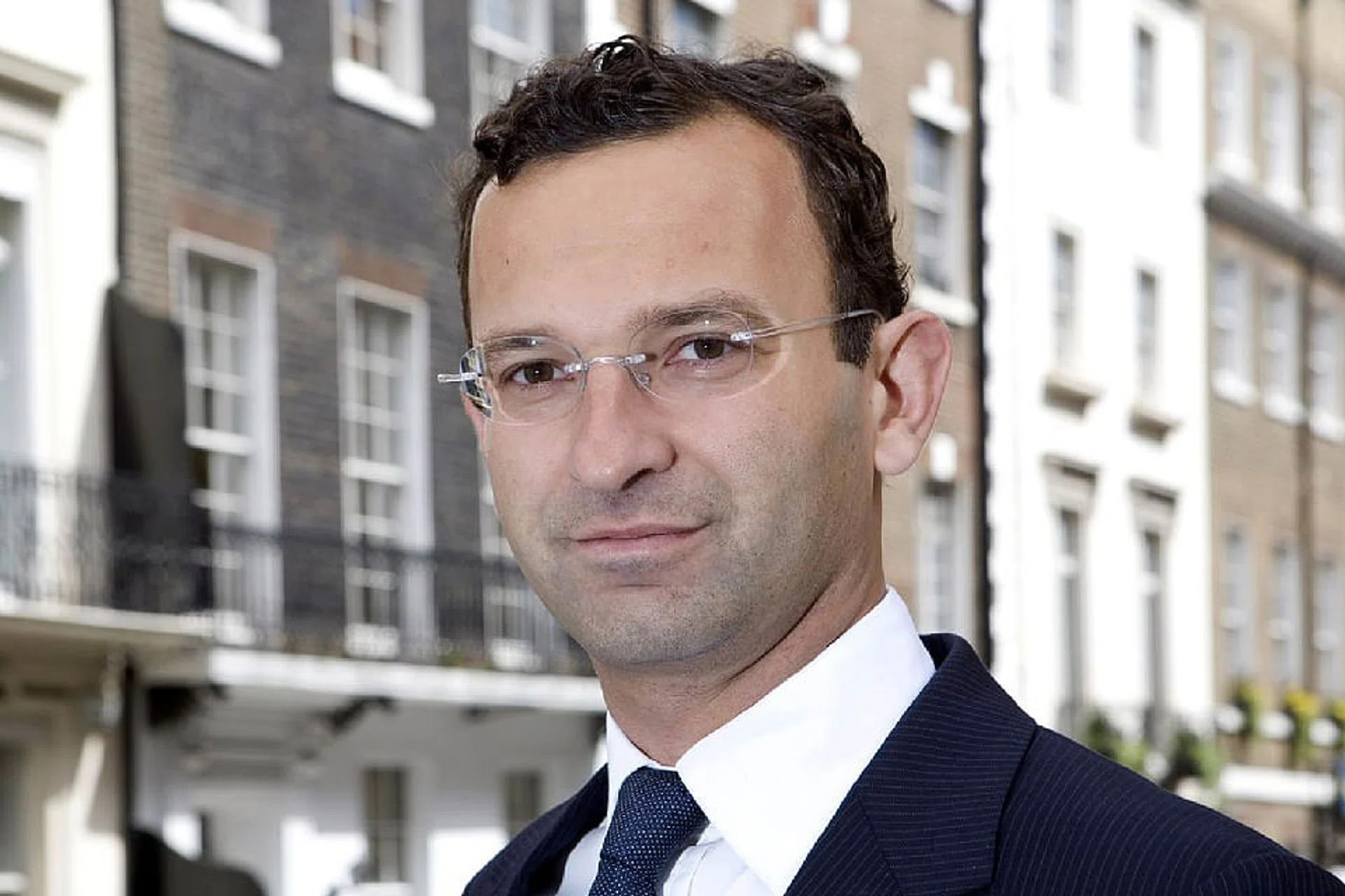 Tycoon behind a crisis-era property crash now mired in 8b euro debt ...